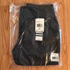 Adidas Performance rain pants.